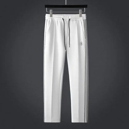 CALAIS — Tracksuit Ensemble