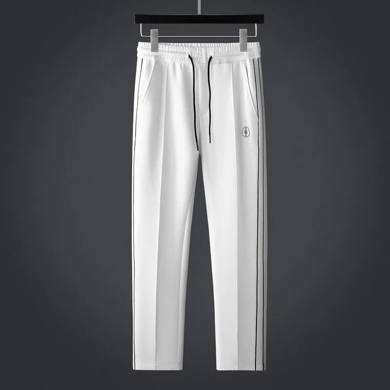 CALAIS — Tracksuit Ensemble