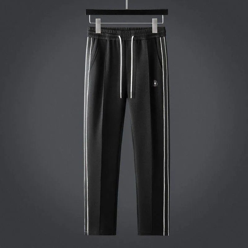 CALAIS — Tracksuit Ensemble